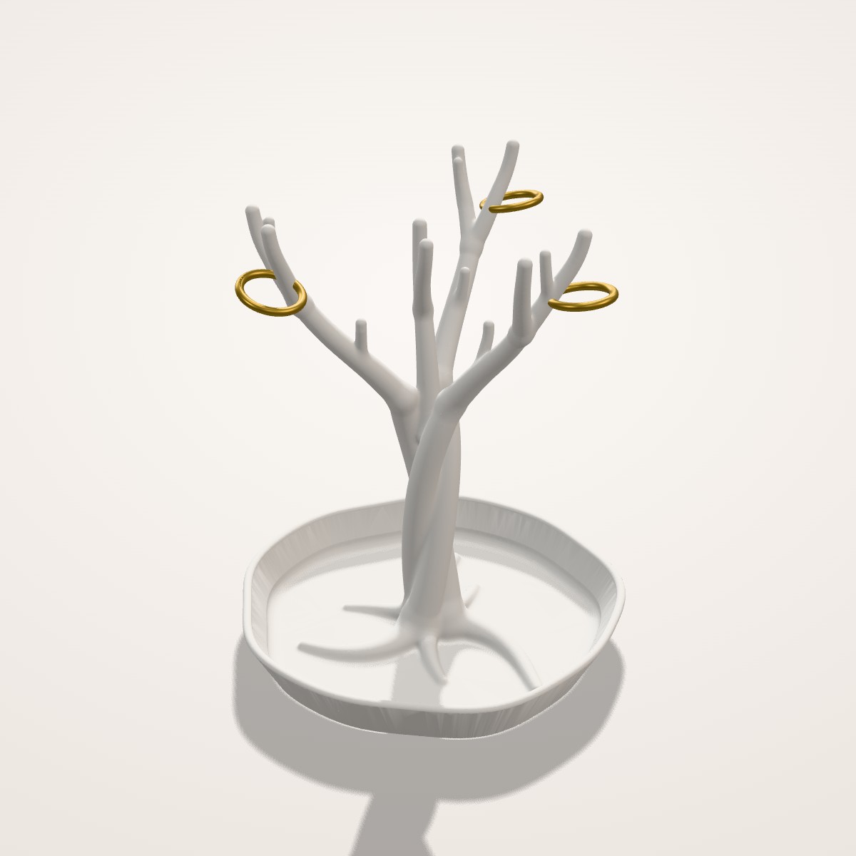 Arbre à bijoux tressé sur coupelle